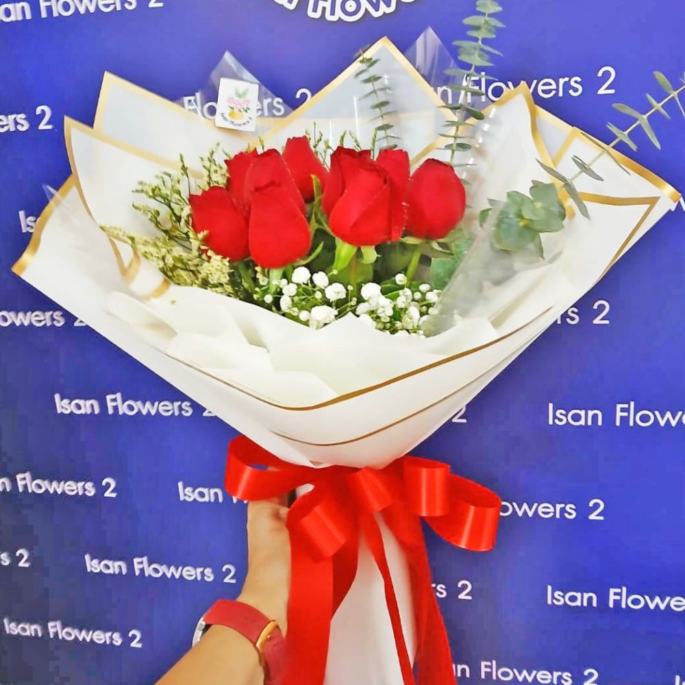 12 big red roses in white round bouquet b