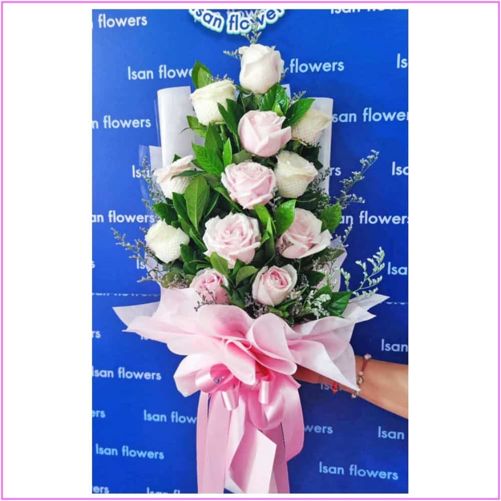 6 pink and 6 white big roses in pink tall bouquet a pre