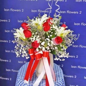 White Lilies with 9 Big Red Roses in Vase